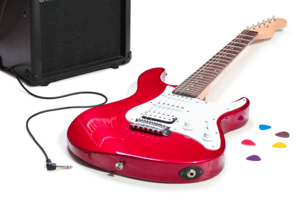 istock Electric guitar and amplifier isolated on a white 811180574