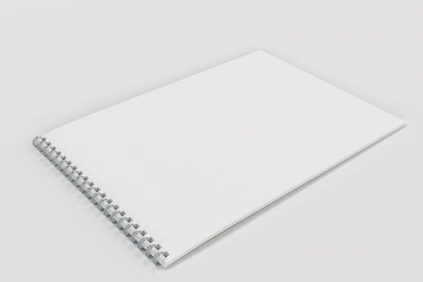 istock Blank white notebook with metal spiral bound on white background 811185200