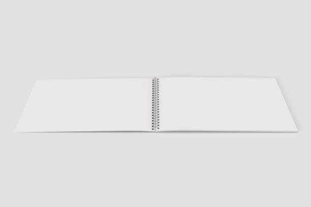 istock Open blank white notebook with metal spiral bound on white background 811186142