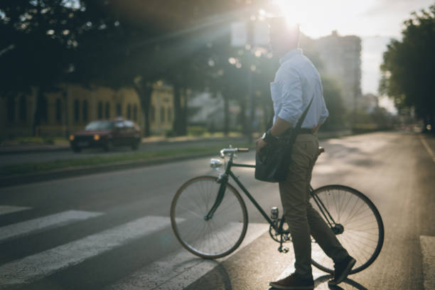 istock Crossing street with a bike 811192392