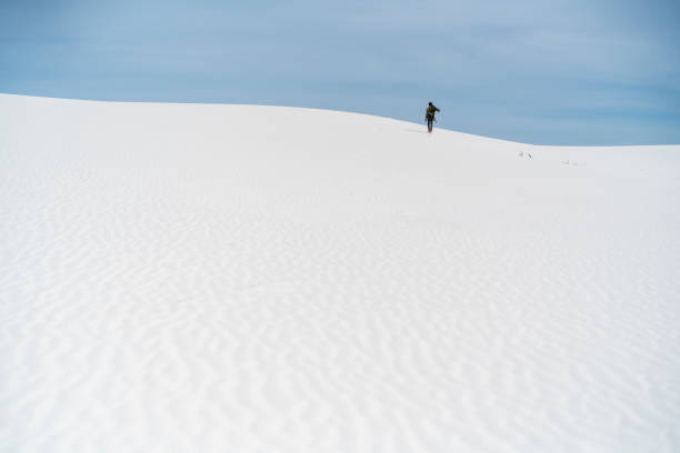 istock The young man, traveller, backpacker, exploring the White Sands National Monument, New Mexico 811214526