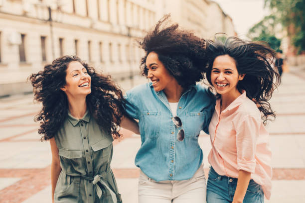 istock Girlfriends hanging out in the city 811243836