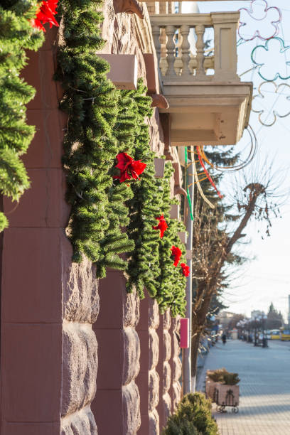istock City building decorated for christmas. 811246910