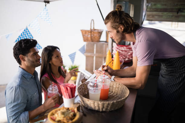 istock Customers giving order to waiter 811247546