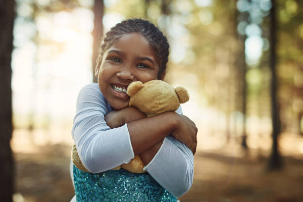 istock Cuddles for her fluffy little friend 811247724