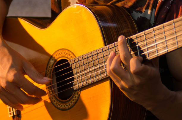 istock The guitarist is playing classical music because it sounds good. Emotionally 811249914