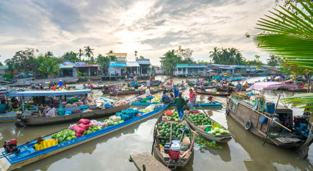 Farmers purchase crowded in floating market morning stock photo