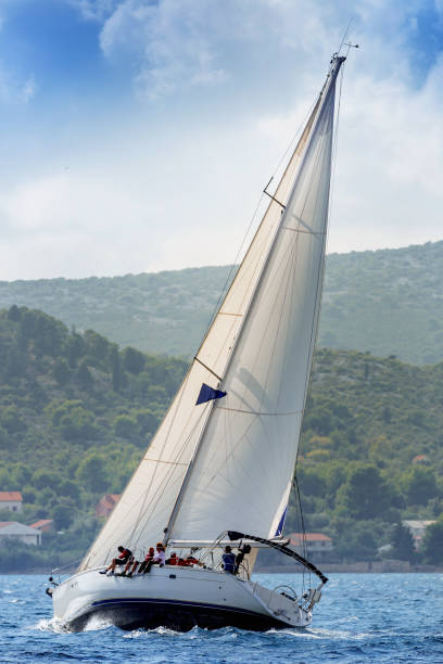 istock Sailing crew enjoying on sailboat 811264846