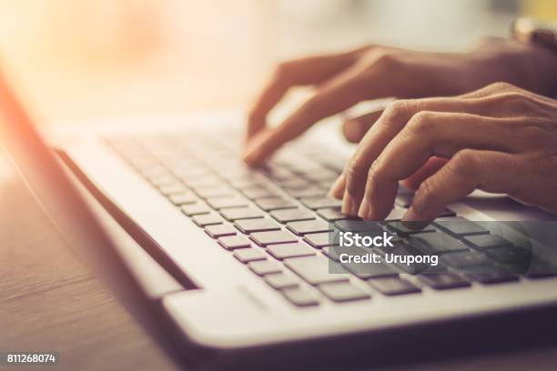 Laptop Computer Desktop Pc Human Hand Office Soft Focus Picture Vintage Concept Stock Photo - Download Image Now