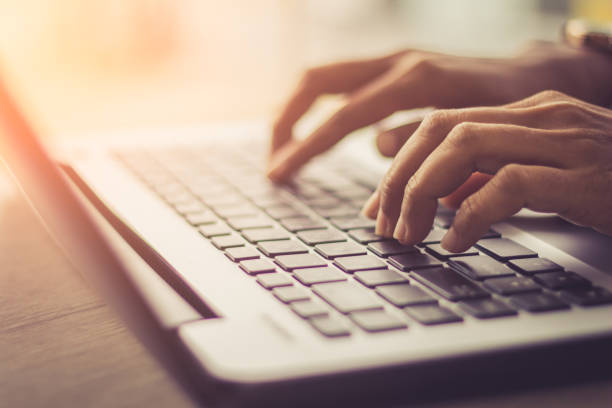 laptop, computer, desktop pc, human hand, office / soft focus picture / vintage concept - computer keyboard human hand computer internet imagens e fotografias de stock