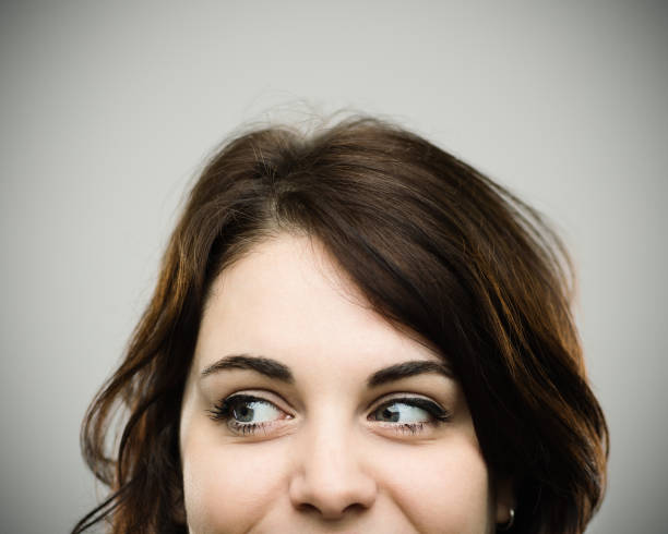 istock Real young happy woman looking to the side 811281054
