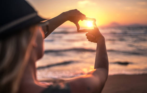 istock Searching for best composition standing near sea at sunset 811307836