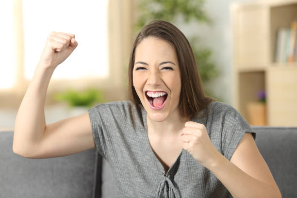 istock Excited woman looking at camera 811318926