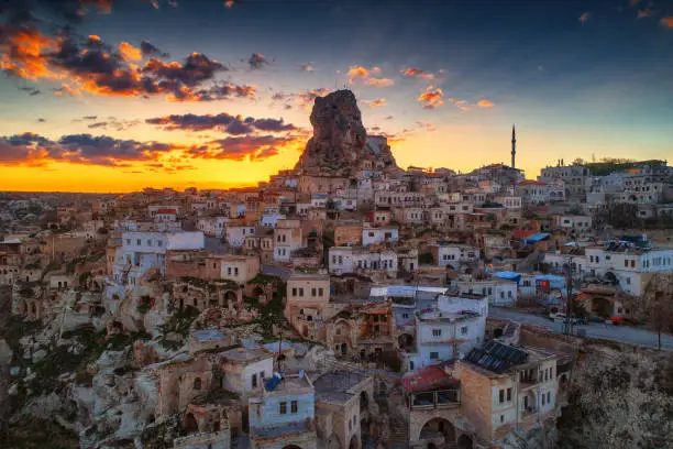 Aerial view of Uchisar castle in the sunset. Cappadocia. Nevsehir Province. Turkey.