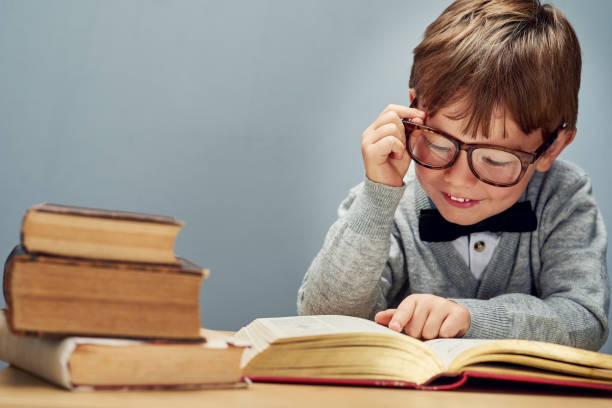 Genius Men Rading Book 160+ Little Genius Boy Reading A Book Stock Photos, Pictures & Royalty ...