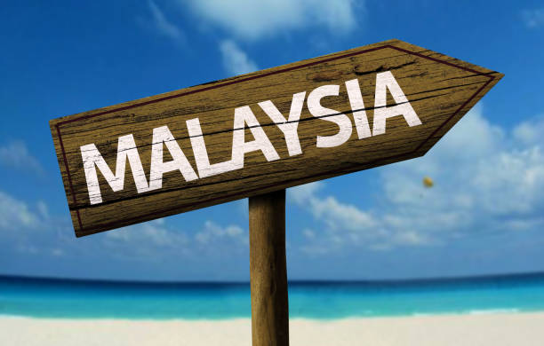 istock Malaysia wooden sign on the beach 811334598