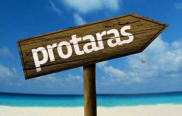 istock Protaras wooden sign on the beach 811355592
