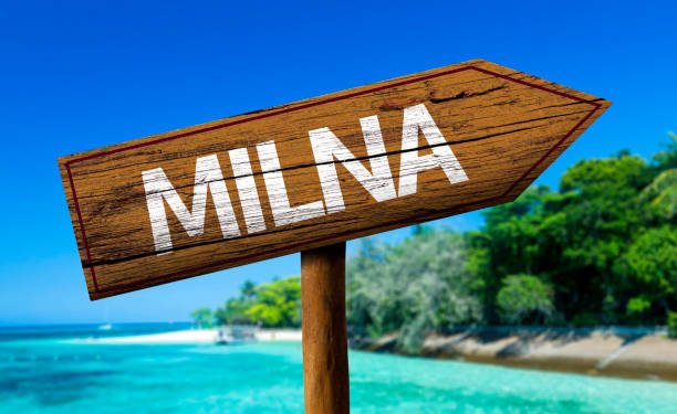 istock Milna wooden sign on the beach 811356184