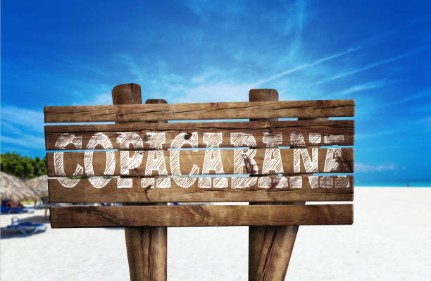 istock Copacabana wooden sign on the beach 811360570