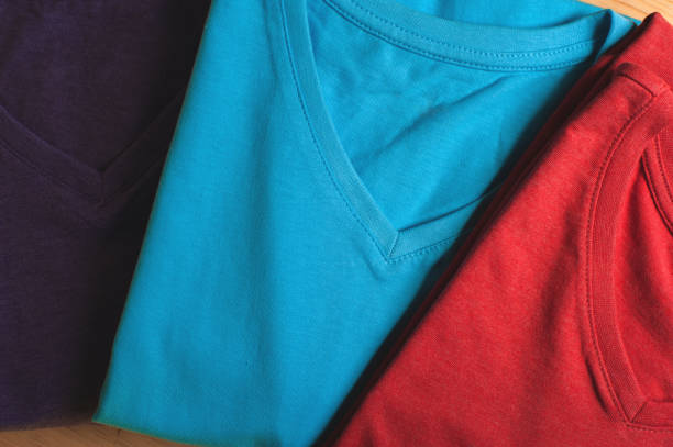 istock Colorful cotton t-shirts, top view 811360628