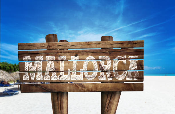 istock Mallorca wooden sign on the beach 811360656