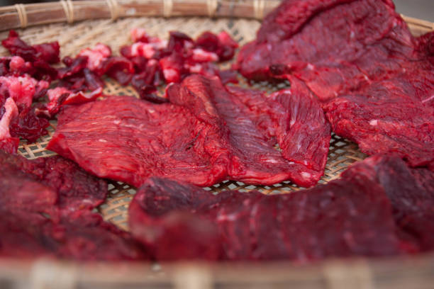 istock Beef drying in the sun, A step that beef can be stored for a long time. 811360722