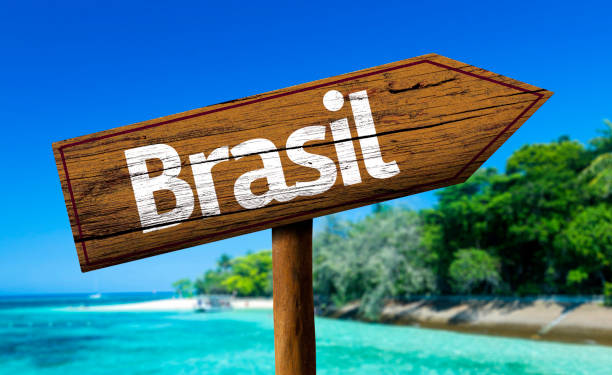 istock Brasil wooden sign on the beach 811360800