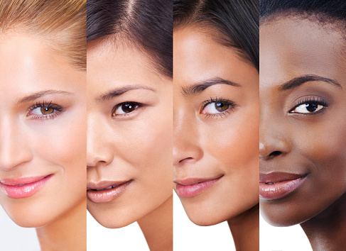 Shot of woman with different skintones superimposed over each other in the studio