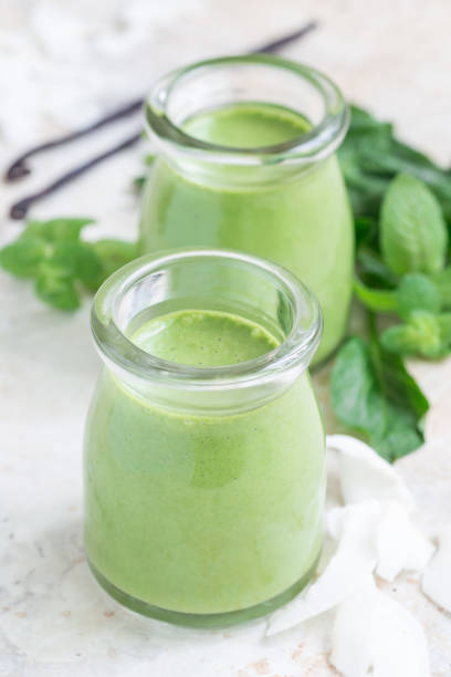 istock Vanilla, mint, spinach and coconut milk detox green smoothie, vertical 811427986