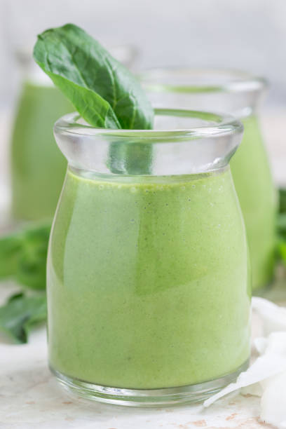 istock Vanilla, mint, spinach and coconut milk detox green smoothie, vertical 811427990