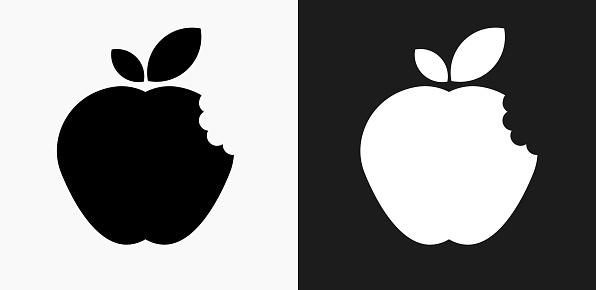 Bitten Apple Icon on Black and White Vector Backgrounds. This vector illustration includes two variations of the icon one in black on a light background on the left and another version in white on a dark background positioned on the right. The vector icon is simple yet elegant and can be used in a variety of ways including website or mobile application icon. This royalty free image is 100% vector based and all design elements can be scaled to any size.