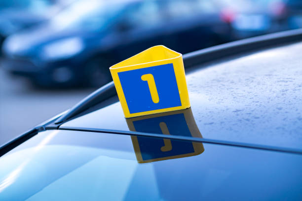 istock Number one plastic sign on motorhood from car in service 811437408