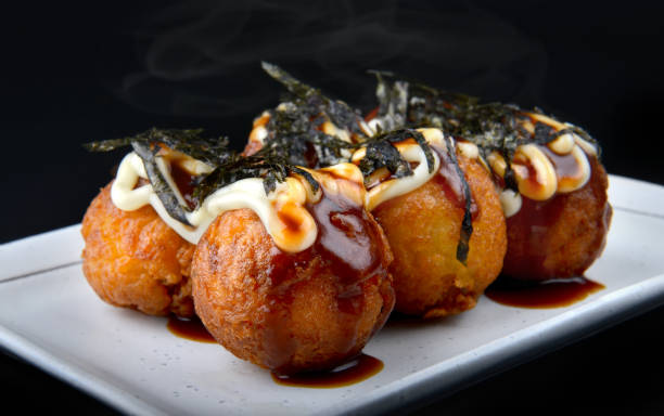 istock Takoyaki or Japanese octopus ball. 811444654