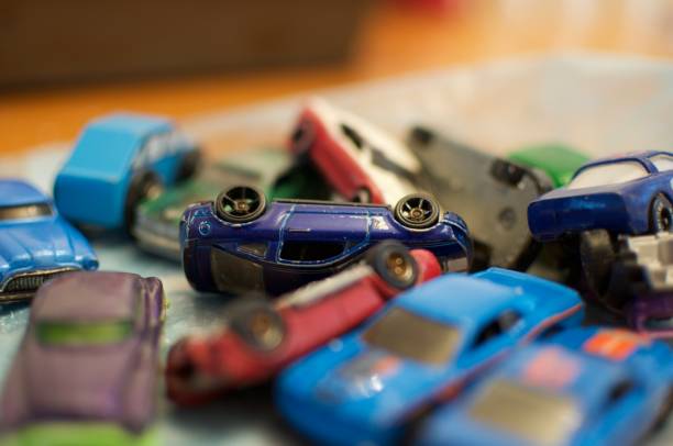 istock Tumbled Toy Cars 811444980