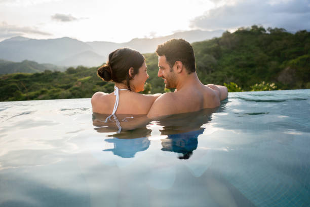 istock Happy couple enjoying their vacations while traveling 811453932