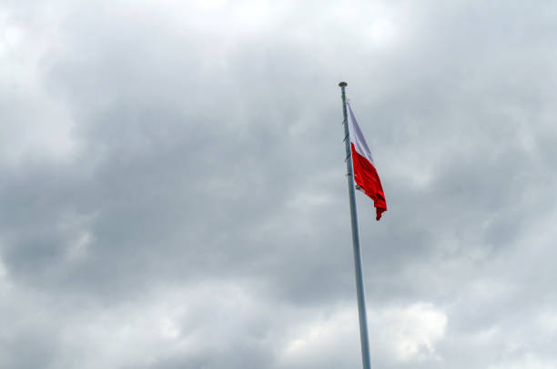 istock Flag of Poland (cloudy sky) 811476026