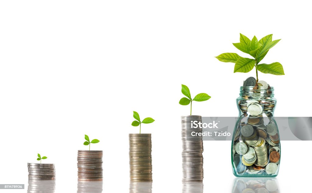 stacks of mix coins with bottle on white background, Business investment growth concept Bank Deposit Slip Stock Photo