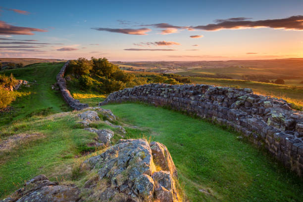 Hadrian's Wall near sunset at Walltown Hadrian's Wall is a World Heritage Site in the beautiful Northumberland National Park. Popular with walkers along the Hadrian's Wall Path and Pennine Way northeastern england stock pictures, royalty-free photos & images