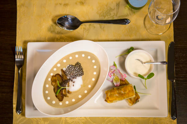 istock Cream soup with white mushrooms. Cream soup in interior design 811492460
