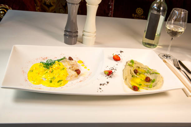 istock flatfish with mash  from artichokes and Ber-Blanc sauce from shrimps and basil 811492682