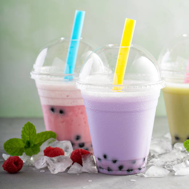 istock Variety of bubble tea in plastic cups 811506080