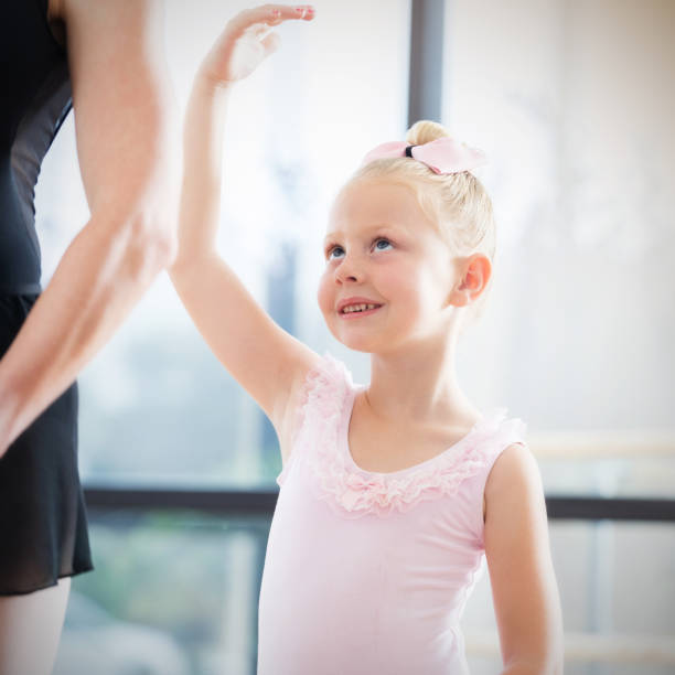 istock Pretty Caucasian little girl in ballet class 811544910
