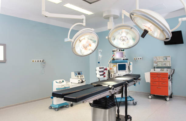 Modern hospital operating room with monitors and equipment