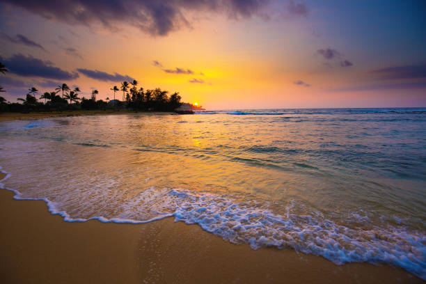 istock Hawaiian Sunrise at Poipu Beach Kauai 811592300