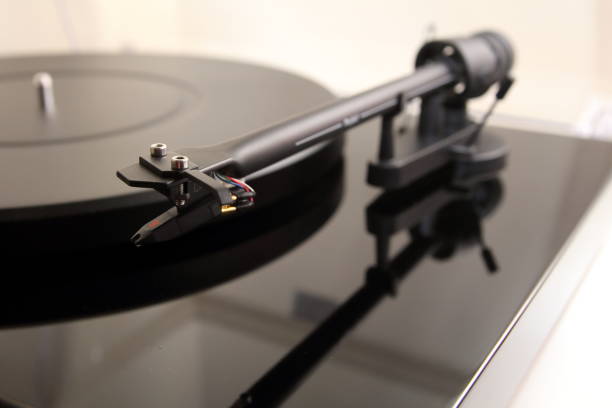 istock Tone arm of a modern high quality turntable record player 811593554