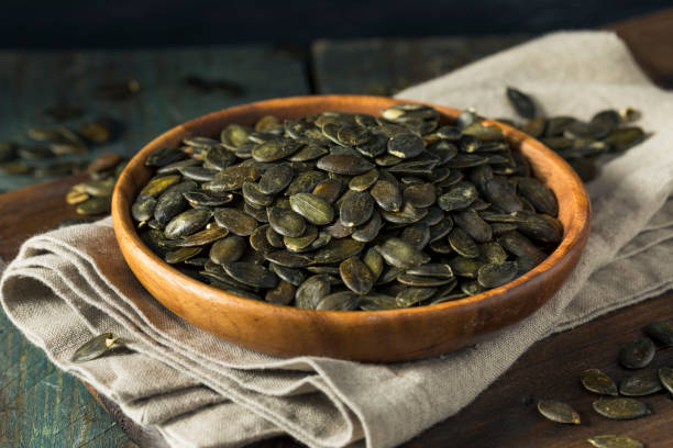 istock Dry Salted Organic Pepita Pumpkin Seeds 811605680