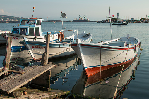Zonguldak eregli district, fishing boats and erdemir iron and steel factory behind