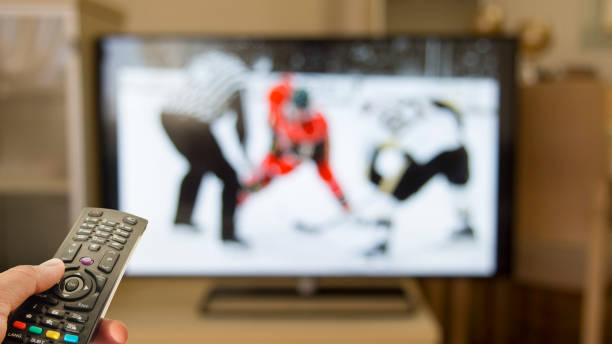 istock ice hokey game on the tv 811620896