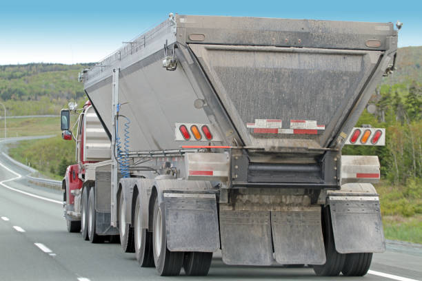 istock Semi Dump Truck, Rear Quarter View 811644276