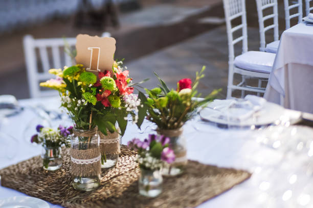 istock Close-up of tiny bouquets on a restaurant table 811651710